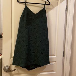 Paper crown rich brocade teal dress with cape.